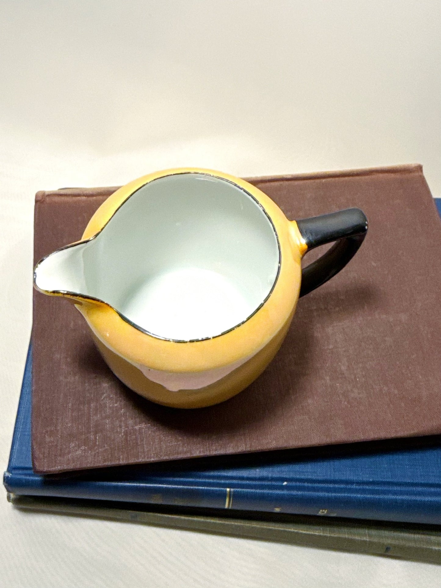 Orange Lusterware Cream Pitcher