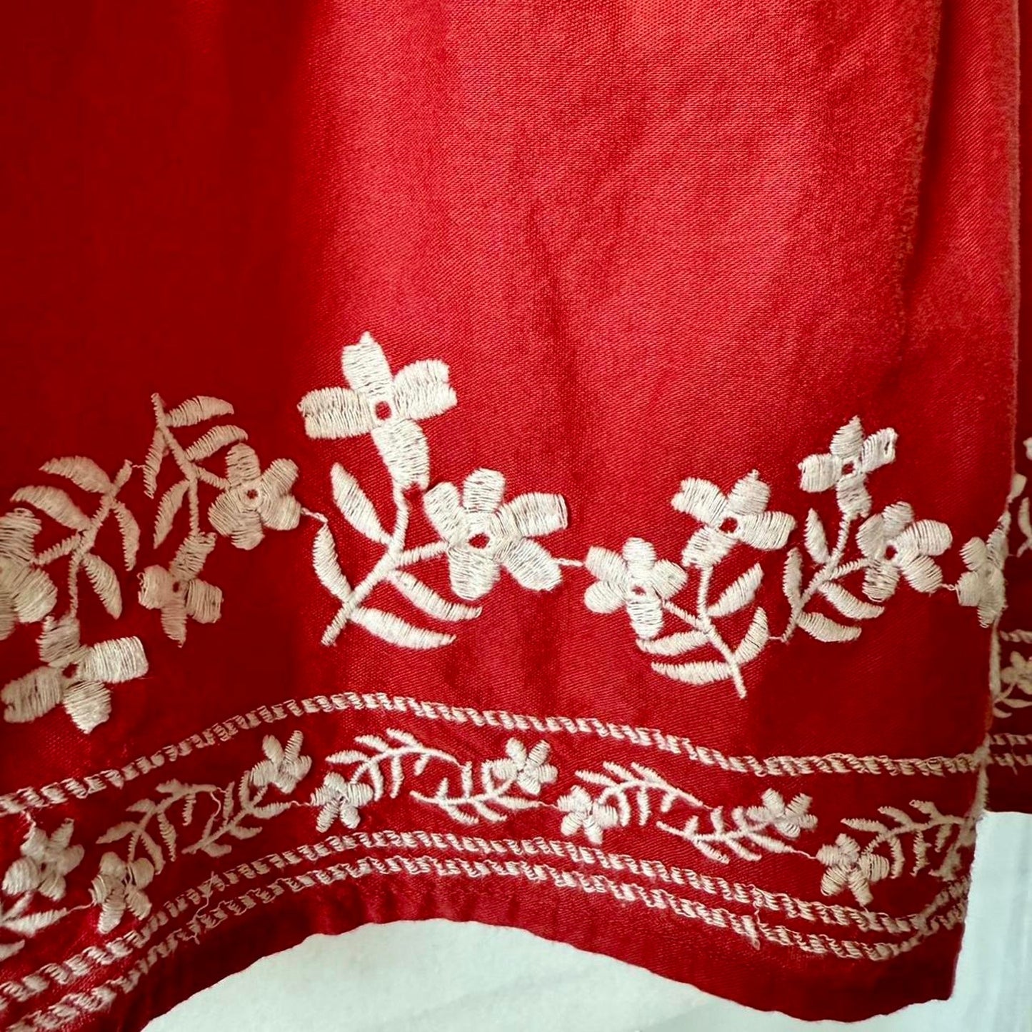 Red orange embroidered blouse with white