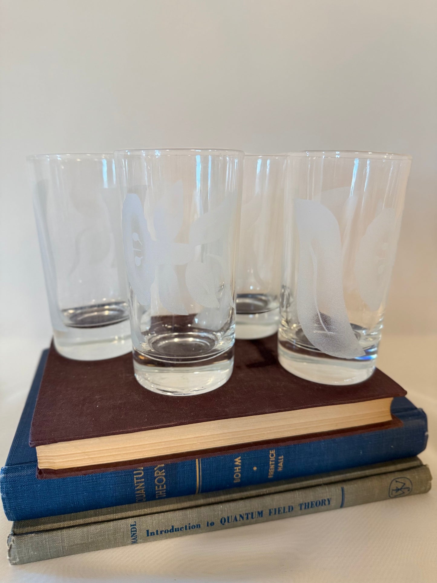 Set of four Etched Glassware