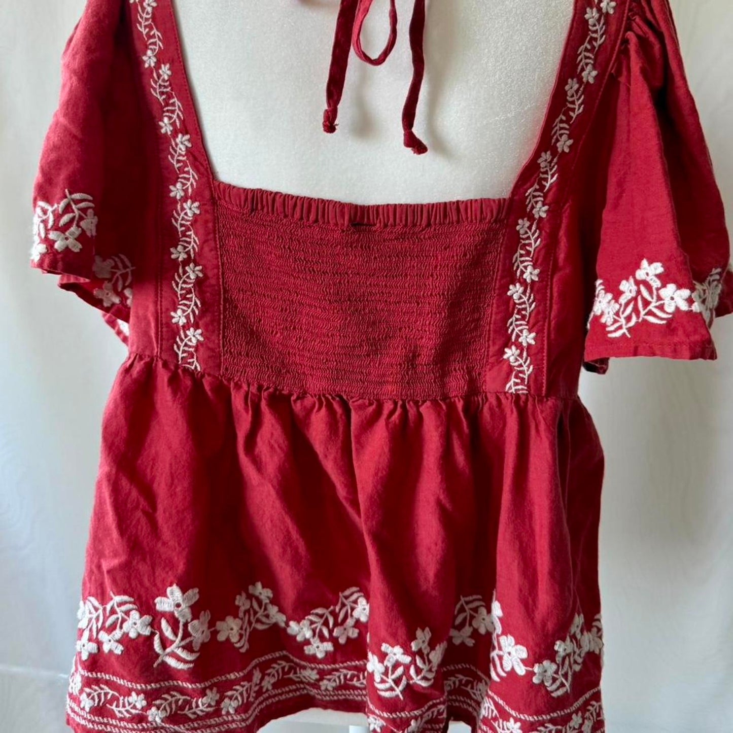 Red orange embroidered blouse with white