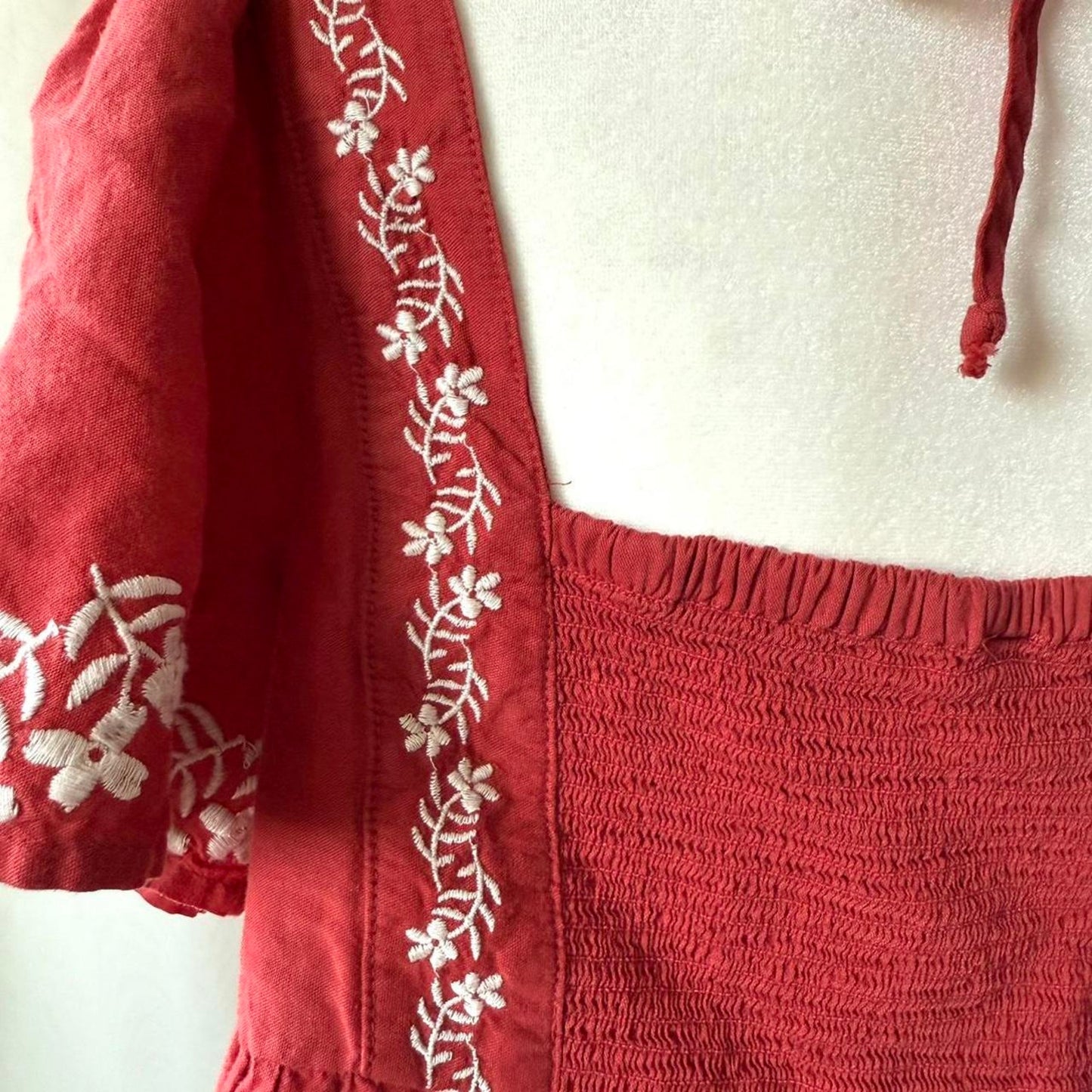 Red orange embroidered blouse with white